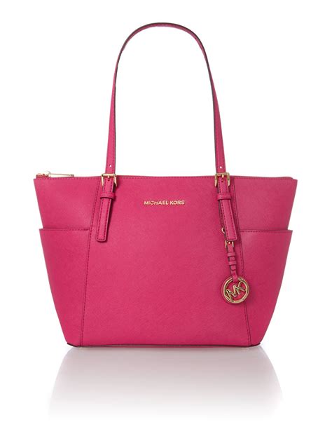 michael kors jet set item pink zip top tote bag|Michael Kors jet set airplane.